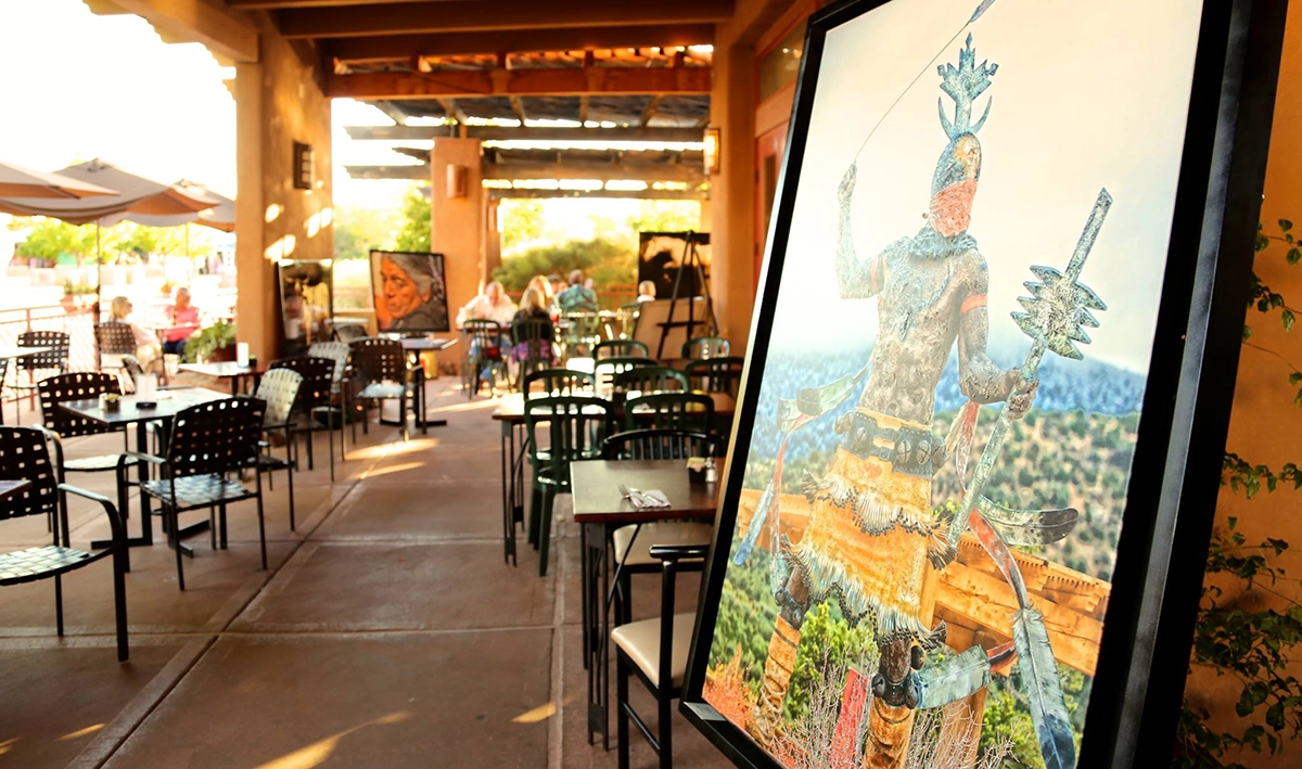 cafe Outdoor restaurant patio with framed artwork on display